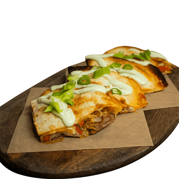 Grilled Chicken Quesadilla with peppers, onions, and jack cheese, topped with cilantro sour cream.