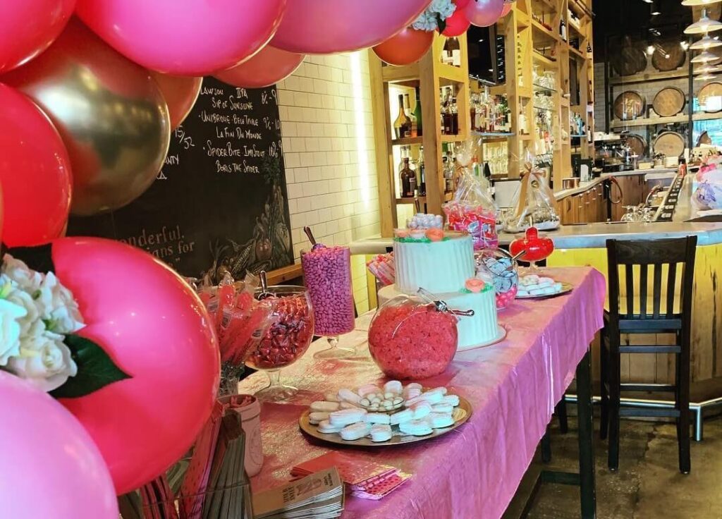 a candy bar set up at market bistro for a private bridal shower