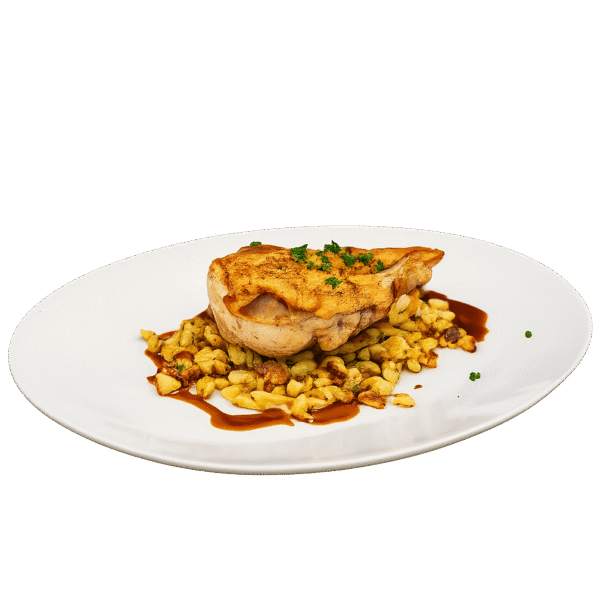 organic roasted chicken served over golden pasta with a rich sauce