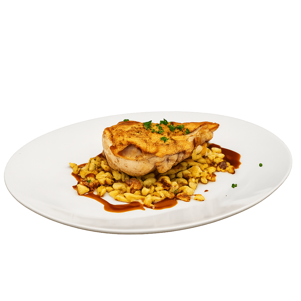 organic roasted chicken served over golden pasta with a rich sauce
